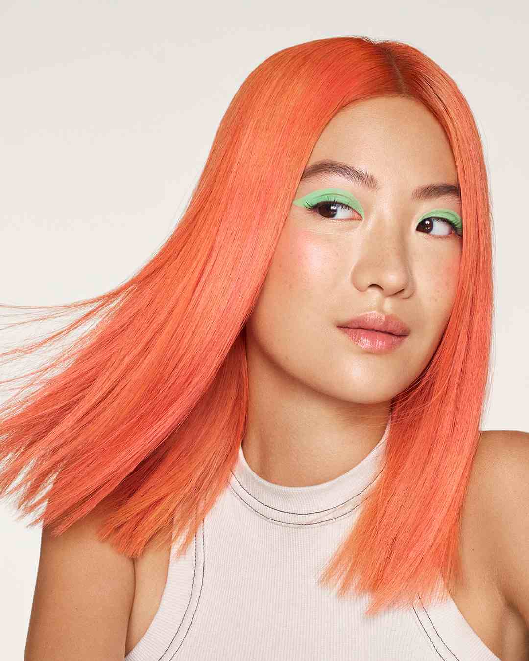 K18 model Cindy with bleached and toned straight peach coloured hair