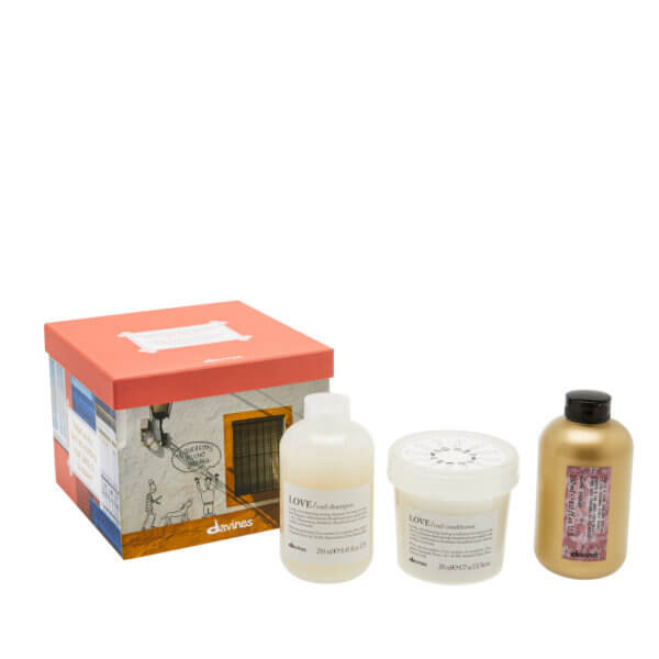 Davines Love Curl Christmas Gift Set showing gift box with Love Curl Shampoo, Conditioner and Curl Building Serum