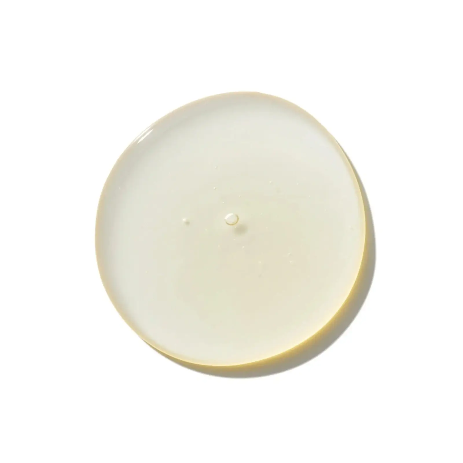 a pool of Eleven Australia deep clean clarifying shampoo liquid