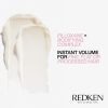 Redken Volume Injection Conditioner showing product consistency and thickness